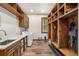 Well-organized mudroom featuring ample storage, laundry facilities, and a window with scenic views at 242 Point View Pl, Breckenridge, CO 80424