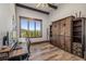 Comfortable office with a large desk and breathtaking views of trees and mountains from the window at 242 Point View Pl, Breckenridge, CO 80424