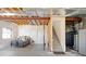Unfinished basement with egress window and walk out is ready for a personalized home design at 22044 E Jamison Pl, Aurora, CO 80016