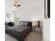 Bedroom with desk, large bed, and neutral decor at 22044 E Jamison Pl, Aurora, CO 80016