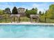 Beautiful community pool with covered cabanas, perfect for relaxation and enjoying the summer weather at 22044 E Jamison Pl, Aurora, CO 80016