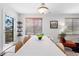 Stylish dining area with modern table setting and natural light at 22044 E Jamison Pl, Aurora, CO 80016