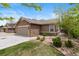 Charming single-Gathering home with stone accents, a two-car garage, and manicured landscaping at 22044 E Jamison Pl, Aurora, CO 80016