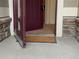 Inviting view of the front door entrance, showcasing the welcome mat and stone facade at 22044 E Jamison Pl, Aurora, CO 80016