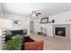 Inviting living room with fireplace and elegant decor, perfect for entertaining guests at 22044 E Jamison Pl, Aurora, CO 80016