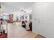 Bright, open-concept living space with modern finishes and wood-look flooring at 22044 E Jamison Pl, Aurora, CO 80016