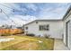 Backyard with detached garage and string lights at 1671 S Chase St, Lakewood, CO 80232