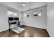 Bright bedroom with hardwood floors and large windows at 1671 S Chase St, Lakewood, CO 80232