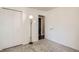 Clean bedroom offering carpeted floors, natural light, closet, and neutral walls at 3358 S Iris Ct, Lakewood, CO 80227