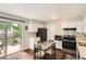 Cozy kitchen with white cabinets and stainless steel appliances at 3358 S Iris Ct, Lakewood, CO 80227