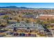 Aerial view of condo building with mountain backdrop at 770 Copper Ln # 206, Louisville, CO 80027