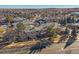 Aerial view of a townhome community, showcasing numerous units and landscaping at 770 Copper Ln # 206, Louisville, CO 80027