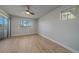 Spacious bedroom with balcony access and a ceiling fan at 770 Copper Ln # 206, Louisville, CO 80027