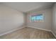 Bedroom with wood-look floors and a view at 770 Copper Ln # 206, Louisville, CO 80027