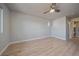 Spacious bedroom with wood-look floors and ceiling fan at 770 Copper Ln # 206, Louisville, CO 80027