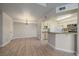 Spacious dining area with kitchen access and laminate floors at 770 Copper Ln # 206, Louisville, CO 80027
