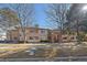 Condo building exterior with trees and walkway at 770 Copper Ln # 206, Louisville, CO 80027