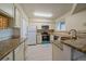 Updated kitchen with granite counters and stainless steel appliances at 770 Copper Ln # 206, Louisville, CO 80027