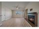 Living room featuring a fireplace and sliding door to balcony at 770 Copper Ln # 206, Louisville, CO 80027