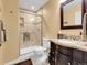 Bathroom features a tile shower, a modern vanity, a toilet, and neutral colored walls at 7138 Mountain Brush Cir, Highlands Ranch, CO 80130
