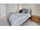 Well-lit bedroom featuring a comfortable bed, ample storage, and serene decor at 7138 Mountain Brush Cir, Highlands Ranch, CO 80130