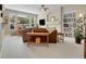 Cozy living room with a large window, comfortable seating and view to a backyard patio at 7138 Mountain Brush Cir, Highlands Ranch, CO 80130