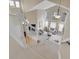 Open concept living room with high ceilings, lots of natural light, and hardwood floors at 7138 Mountain Brush Cir, Highlands Ranch, CO 80130