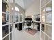 Bright office with vaulted ceiling, large windows, desk, and plenty of natural light at 7138 Mountain Brush Cir, Highlands Ranch, CO 80130