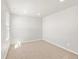 Bedroom features carpeted floor and bright natural light at 17487 E 89Th Way, Commerce City, CO 80022