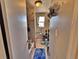 Compact bathroom with tiled shower and bath, offering essential amenities in a functional space at 6060 Locust St, Commerce City, CO 80022