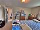 Cozy bedroom shows bed and furnishings at 6060 Locust St, Commerce City, CO 80022