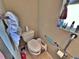 Small toilet room featuring grab bars and small window at 6060 Locust St, Commerce City, CO 80022