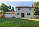 Well-maintained backyard featuring a lush green lawn and privacy fence, ideal for outdoor enjoyment at 8538 W Glasgow Pl, Littleton, CO 80128