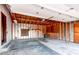 Spacious garage with ample storage and workspace, ready for your projects and vehicles at 8538 W Glasgow Pl, Littleton, CO 80128