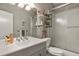 Bathroom featuring a modern sink, vanity, mirror, and a tub with shower at 929 Tenderfoot Dr, Larkspur, CO 80118