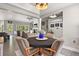 Open-concept dining area connected to the living room at 929 Tenderfoot Dr, Larkspur, CO 80118