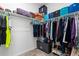 A full walk-in closet with shelving and hanging storage at 18060 E 106Th Pl, Commerce City, CO 80022