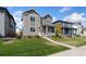 Beautiful two-story home with a well-manicured lawn and inviting curb appeal at 18060 E 106Th Pl, Commerce City, CO 80022