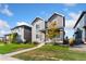 Attractive two-story home featuring a covered porch and lush green lawn at 18060 E 106Th Pl, Commerce City, CO 80022