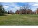 A well-maintained building is surrounded by lush green space at 6148 Willow Ln, Boulder, CO 80301