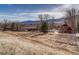 Sprawling horse property featuring barns and pastureland, perfect for equestrian enthusiasts at 10425 Red Mountain West, Littleton, CO 80127