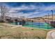 Well-kept tennis and pickleball courts, perfect for sports enthusiasts to enjoy an active lifestyle at 10425 Red Mountain West, Littleton, CO 80127