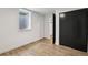 Basement bedroom or office features natural light and closet at 7123 S Hudson Cir, Centennial, CO 80122