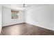 Bedroom featuring hardwood floors and a window that brings in lots of natural light at 7123 S Hudson Cir, Centennial, CO 80122