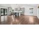 Spacious kitchen with stainless steel appliances, gray cabinets, and island at 7123 S Hudson Cir, Centennial, CO 80122