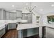 Bright kitchen featuring stainless steel appliances and modern lighting at 7123 S Hudson Cir, Centennial, CO 80122