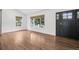 Open living room with wood floors and ample natural light at 7123 S Hudson Cir, Centennial, CO 80122