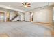 Large basement recreation area with carpeted floor at 38911 E Wesley Ave, Bennett, CO 80102