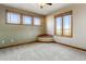 Comfortable basement bedroom with built in window seat at 38911 E Wesley Ave, Bennett, CO 80102