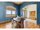 Elegant dining room with hardwood floors and a view at 38911 E Wesley Ave, Bennett, CO 80102